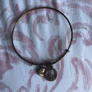 Gold Alex and Ani bracelet peace sign charm